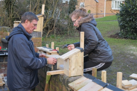 Friends of Hill Hook building bird boxes for the site