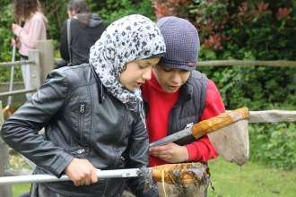 Children pond dipping at EcoPark