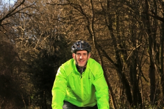 Richard cycling in a wood