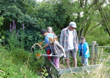 Children pond dipping at EcoPark