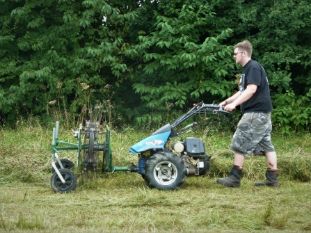 Senior Conservation Officer Tom making hay